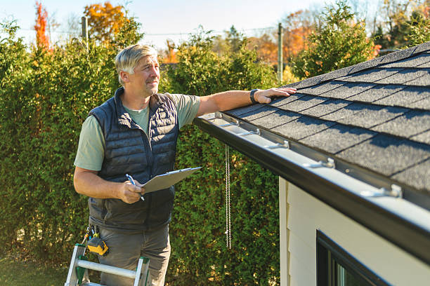 Professional Roof Replacement technician working in Grand Forks, ND
